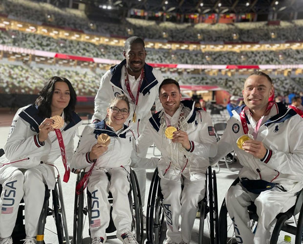 Paralympic athletes holding medals